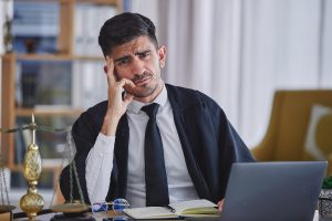 A probate lawyer working on laptop
