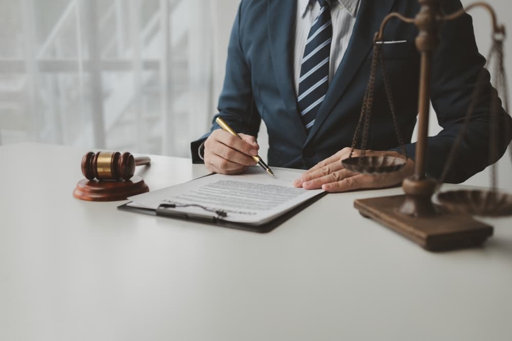 Guardianship attorney working in his office