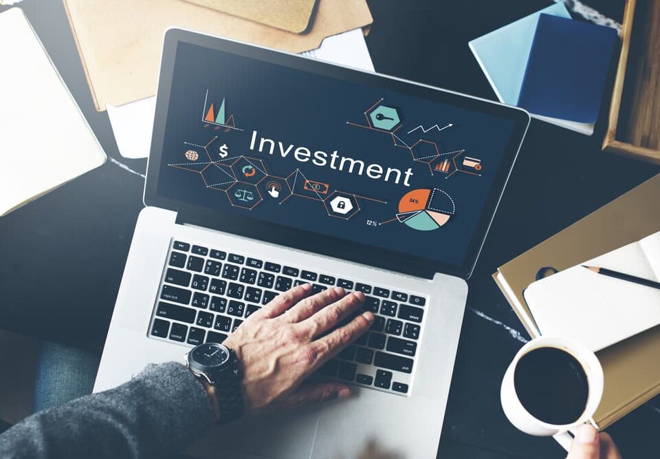A person looking investment on his laptop