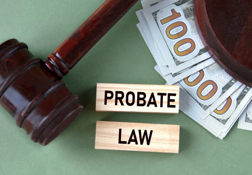 blocks with 'probate law' written, next to gavel and money
