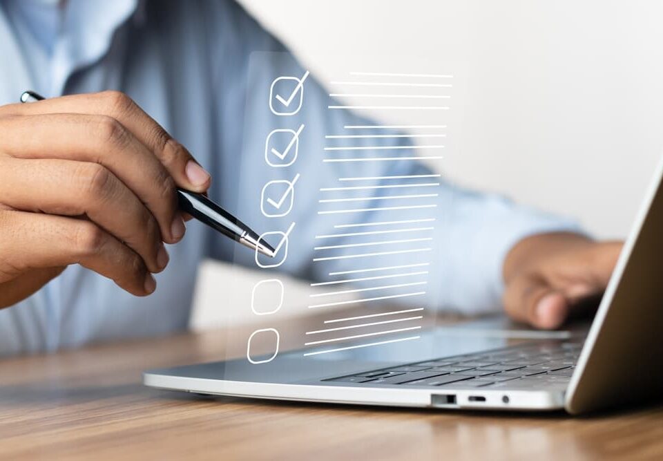 person with digital checklist