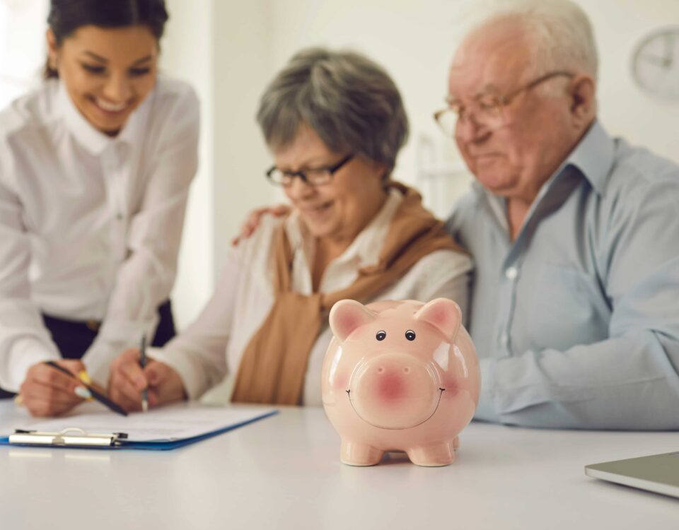 Elderly couple reviewing pension fund